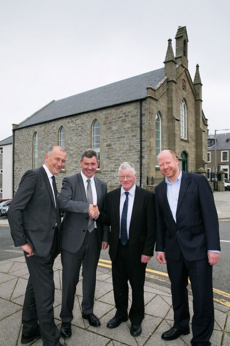 Chris Dowle, Harper MacLeod chairman Professor Lorne Crerar, Paul Rutherford and Harper MacLeod partner Donald Munro outside the DSR offices at St Olaf's Hall in Lerwick. Photo John Coutts)