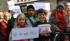 Isles youngsters at a vigil for Syrian refugees at the Market Cross in Lerwick on Saturday. Photo: Shetnews/Hans Marter