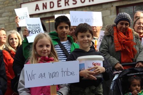 Isles youngsters at a vigil for Syrian refugees at the Market Cross in Lerwick on Saturday. Photo: Shetnews/Hans Marter