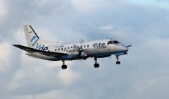 A Loganair-operated Saab 340 mid flight.