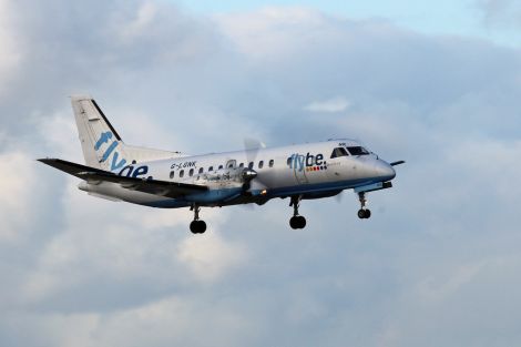 A Loganair-operated Saab 340 mid flight.