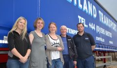 Kaila McCulloch, Emma Harmer and Rona Arthur from the Shetland Solidarity with Refugees group, along with Shetland Transport's Hamish Balfour and Raymond Stewart, after packing up the final pallet ahead of shipping donations to Inverness six weeks ago. Photo: Shetnews/Neil Riddell