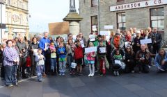 Scores of people turned up at a vigil at Lerwick's Market Cross in September, declaring that refugees would be welcome in the isles. Photo ShetNews