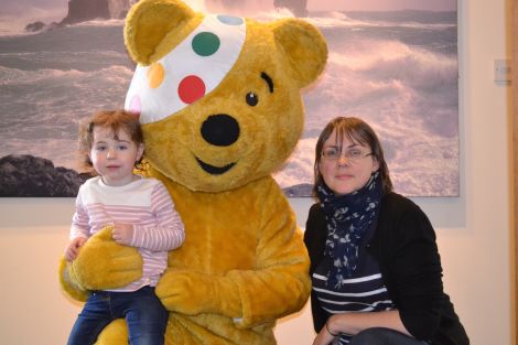 Anne-Lise Anderson and her daughter Astrid meet Pudsey, the Children in Need bear.