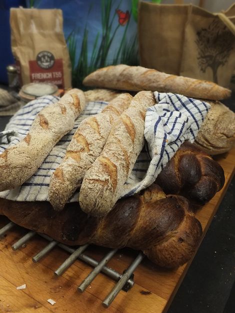 Sandwick school janitor Gus Dow demonstrates his bread-making expertise. Photo: Elizabeth Atia