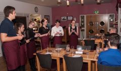 Now what was that order again? Sandwick junior high pupils take tips on how to take orders at Hay's Dock Café. Photo SAT