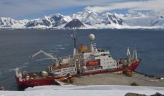 A BAS ship at the Rothera station's pier in Antarctica.