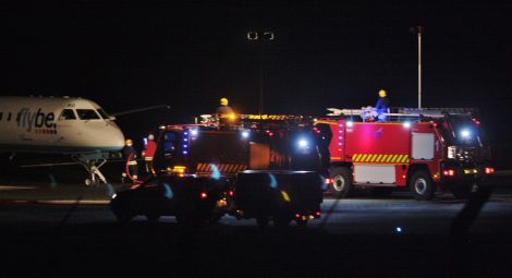 The aircraft was surrounded by fire engines were coming to a standstill on the runway at 9.45pm on Wednesday - Photo: Ronnie Robertson