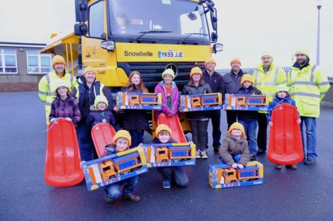 Winners and runners up in the council’s ‘Name a Gritter’ competition, with Roads staff and Councillors. Photo: SIC