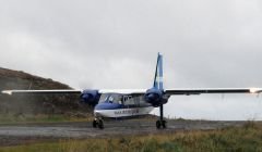 Flying no more. An Islander aircraft operated by Direct Flight for Shetland Islands Council touches down on Scotland's shortest runway.