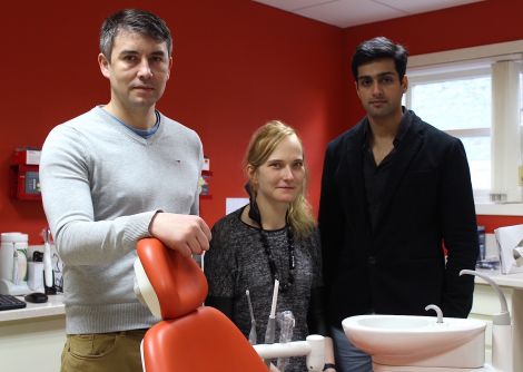 Lerwick's new dentists Ernesto Fernandez Dias (left) and Stefan Arora, with receptionist Ewa Arora on the opening day for Lerwick Dental Practice. Photo Hans J Marter/Shetnews