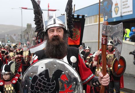 Guizer Jarl Solmund Sigurson of Tonsberg and his squad of 69 Viking about to set off from the Lerwick Legion on Tuesday morning - Photos: Hans J Marter/ShetNews