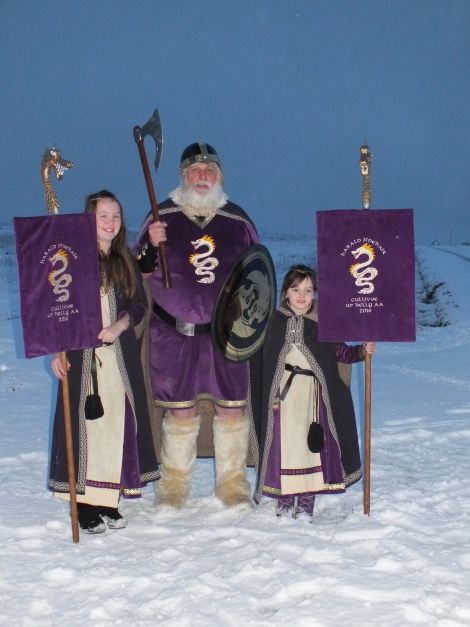 Cullivoe guizer jarl John Saunders (aka Harald Finehair) with his two princesses, niece Bernadette (left) and granddaughter Jolie.