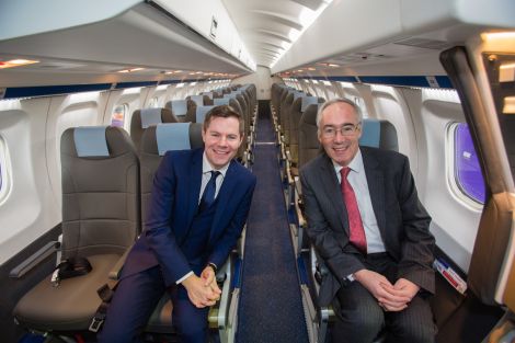 Transport minister Derek Mackay joins Loganair chairman David harrison in the newly refurbished Saab 340 - Photos: Loganair