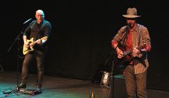 Rich Hall, right, joined by guitarist Rob Childs at Mareel on Tuesday night. Photo: Davie Gardner