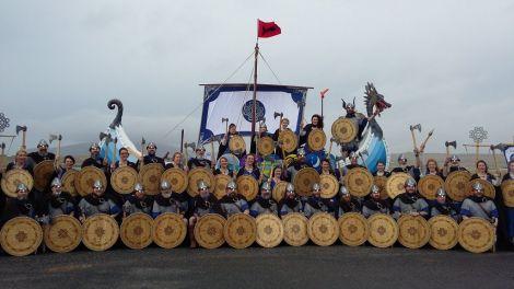 The 48 strong squad line up aboard and around the galley The Sea King with Guider Jarl Scott Lobban at the helm outside Sumburgh Hotel.