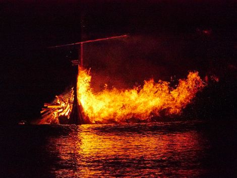 The galley burns on the sea off Peerie Spiggie beach. Photo Chris Brown