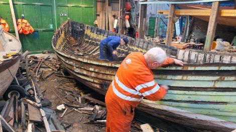 Robbie Tait and Jack Duncan working on the restoration. Photo Shetland Museum and Archives