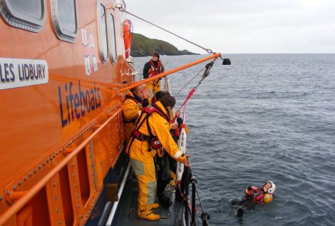 Elizabeth Atia in the water during a woman overboard exercise with the Aith lifeboat.