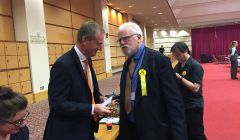 The SNP's Danus Skene conceding defeat to Tavish Scott at the Clickimin Bowls Hall on Thursday night.