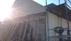 The collapsed gable end wall at an under-renovation Market Street property on Monday evening.