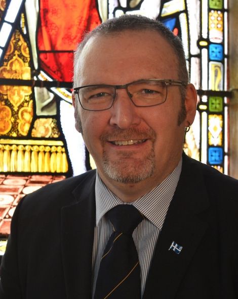 SIC leader Gary Robinson favours elected trustees on Shetland Charitable Trust.