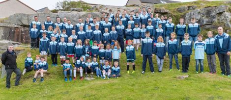 Players and coaches from Lerwick Thistle FC gathered with their new merchandise at Gilbertson Park on Tuesday night.