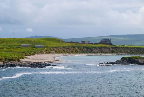 Coastal erosion has uncovered what may be historically significant remains at the Sands of Sound. Photo: SAT