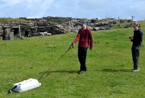 Jonathan Marsh and Anne Harding using ground-penetrating radar technology.