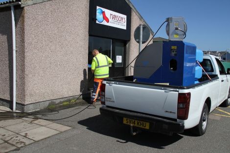 Using hot water to kill weeds is good for the environment - Photo: William Spence