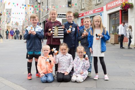 From back left to front right: Jayden Wiseman (7), competition winner Kayla Shearer (10), Cory Burgess (9), Joe Robinson (6), Shannon Burgess (7), Conner Burgess (4), Thea Williamson (5), Mia Wiseman (5). Photo: Ben Mullay.