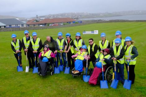 council representatives, current users and contractors DITT met at Seafield to cut the turf for the new Eric Gray resource Centre - Photo: SIC