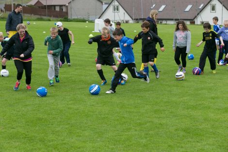 Dribbling practice at this year's Burra Soccer School.