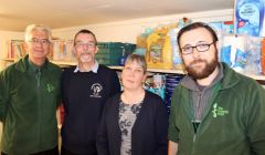 The Trussell Trust's Jim Robertson (left) and Ewan Gurr (right) pictured with David Grieve and Angela Nunn. Photo: Chris Cope/Shetnews