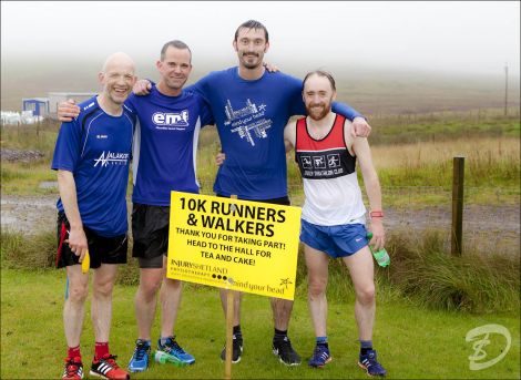 The first four home in the 10k, from left Niall Bristow (second), Andrew Wishart (fourth), Alan Williamson (third) and Bonar Barclay (first). Photo: Dale Smith