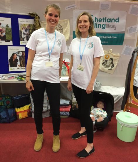 Hazel Ann Johnson and Louise Thomason at the Shetland Sling Library stall at Clickimin last weekend.