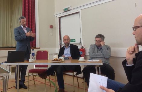 Robert Thorburn of BT addressing the digital forum meeting in Skeld on Saturday, as O2's Paul James and HIE's Stuart Robertson look on.