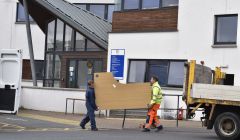 Desks being moved out of the North Ness offices on Tuesday lunchtime. Photo: Andrew Gibson/Millgaet Media