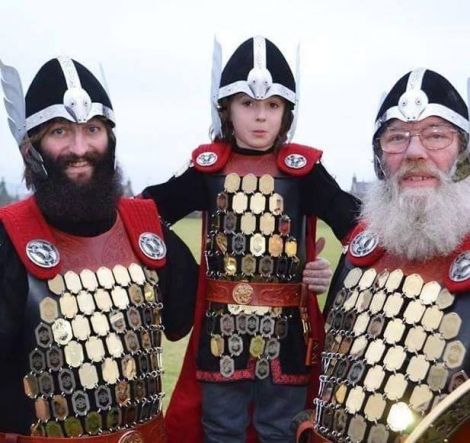 Lerwick guizer jarl for 2032 Gary Smith with his son Jackson and dad Willie.