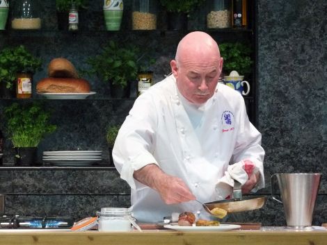 Visiting Master Chef George McIvor dishes up his meal made of Shetland produce. Photos: Elizabeth Atia