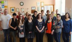 Some of the people working at Market House gather for a group photo in the reception area. Back row (l to r): Janice Hawick, Citizens Advice Bureau (CAB); Val Farnworth, Moving On Employment project (MOEP); Katrina McLachlan, Voluntary Action Shetland (VAS); Julie Manson, MOEP; Shona Manson, Family Mediation; Helen Fullerton, MOEP; Malcolm Johnson, Disability Shetland. Front row (l to r): Iain Souter, Victim Support; Louise Manson, MOEP; Alexis Robertson, CAB; Karen Eunson, CAB; Ellen Hughson, VAS, Mairi Jamieson, Shetland Befriending Scheme; Lynette Nicol, VAS; Ayesha Huda, VAS.