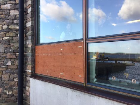 A boarded-up window at the Shetland Museum following last week's break-in. Photo: Hans J Marter/Shetnews