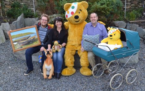 BBC Radio Shetland presenters Daniel Lawson, Jane Moncrieff and John Johnston with Pudsey Bear, the Children in Need mascot.