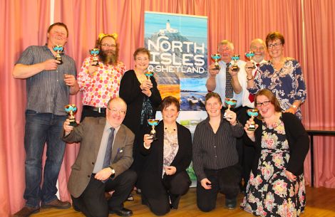 Back row from left to right: Erland Smith, Mark Lawson, Mary Nicolson, Charlie Priest, Robert Jameison and Anna Niven. Front row from left to right: Nigel Stickle, Lorraine Thomson receiving for her son Michael Thomson, Desley Stickle and Julie Thomson. Not present to receive awards were Joanne Bell and Richard Spence.