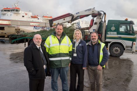 From left to right - Gary Bain of Living Lerwick, Robbie Leslie of Northwards, Charlene Moffat of Northlink and Neil Robertson of the SIC. Photo: Ben Mullay