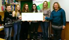 Presenting a cheque for £3,000 to Astryd Jamieson and Karen MacKelvin (right) are Anderson High School S3 pupils (l to r) Eilidh Johnson, Arwen Grieve, Eli Harvey and Jessica Irvine.