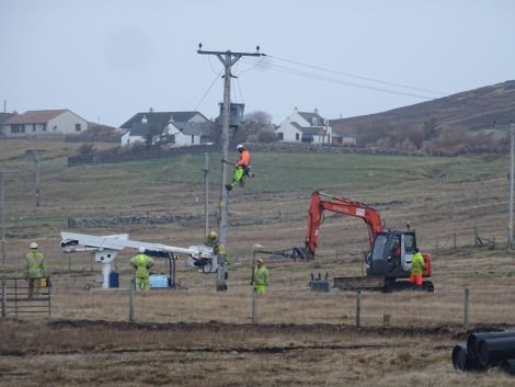 Engineers working to restore power to Bressay on Saturday morning. Photo: John Bateson