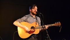 Kris Drever performing at Sandwick's Carnegie Hall in November. Photo: Shetland News.