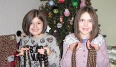 A new look just in time for Christmas: Faye Anderson and Lori Sutherland displaying their chopped-off locks.