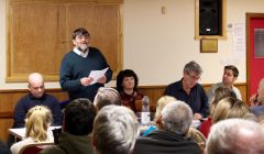 Jonathan Wills speaking at the latest Althing debate as Ryan Thomson (left), chairwoman Karen Fraser (centre), Donald Murray (second from right) and Thor Holt (right) look on. Photo: Yetti Biscuit